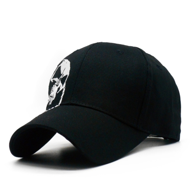 Stylish black baseball cap with a white skull design, perfect for rave outfits and rock looks.