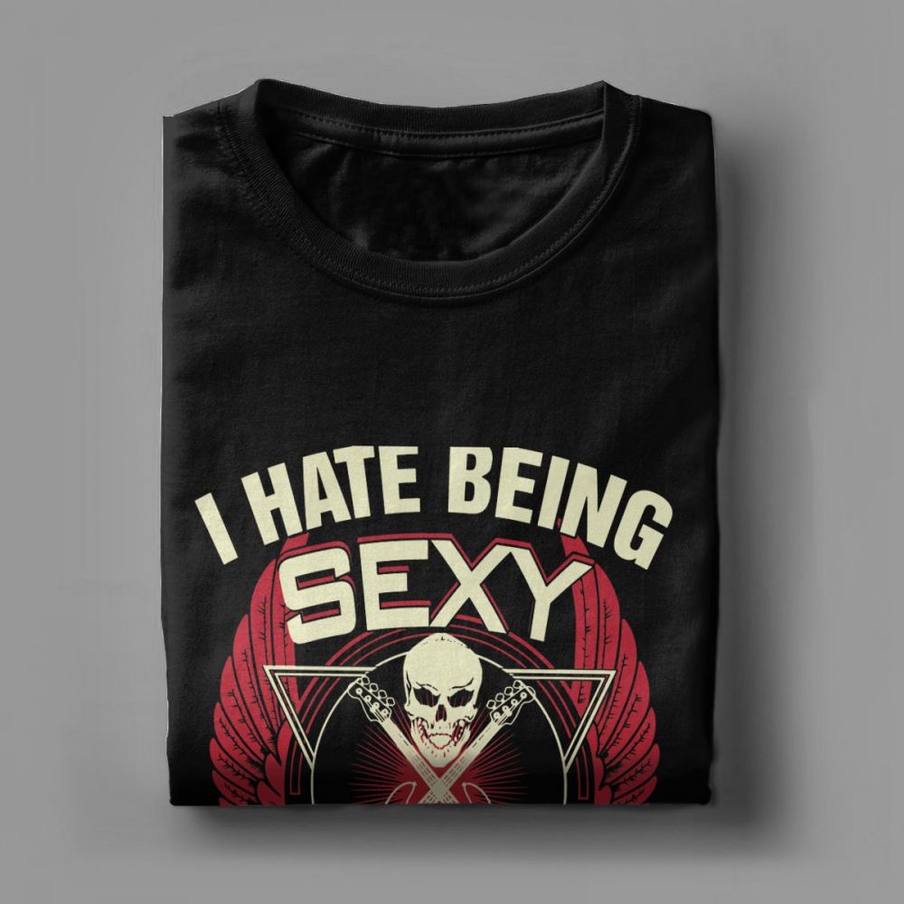 Black bass guitar t-shirt featuring 'I Hate Being Sexy' with a skull and wings graphic, perfect for rock fans.