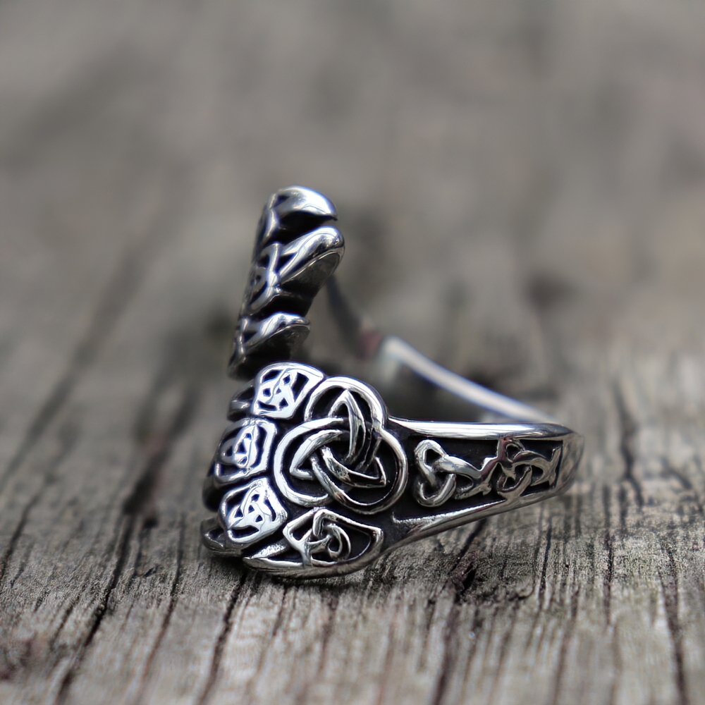 Bear Claw Stainless Steel Ring with Triquetra design on a rustic wooden background, perfect for Nordic style jewelry.