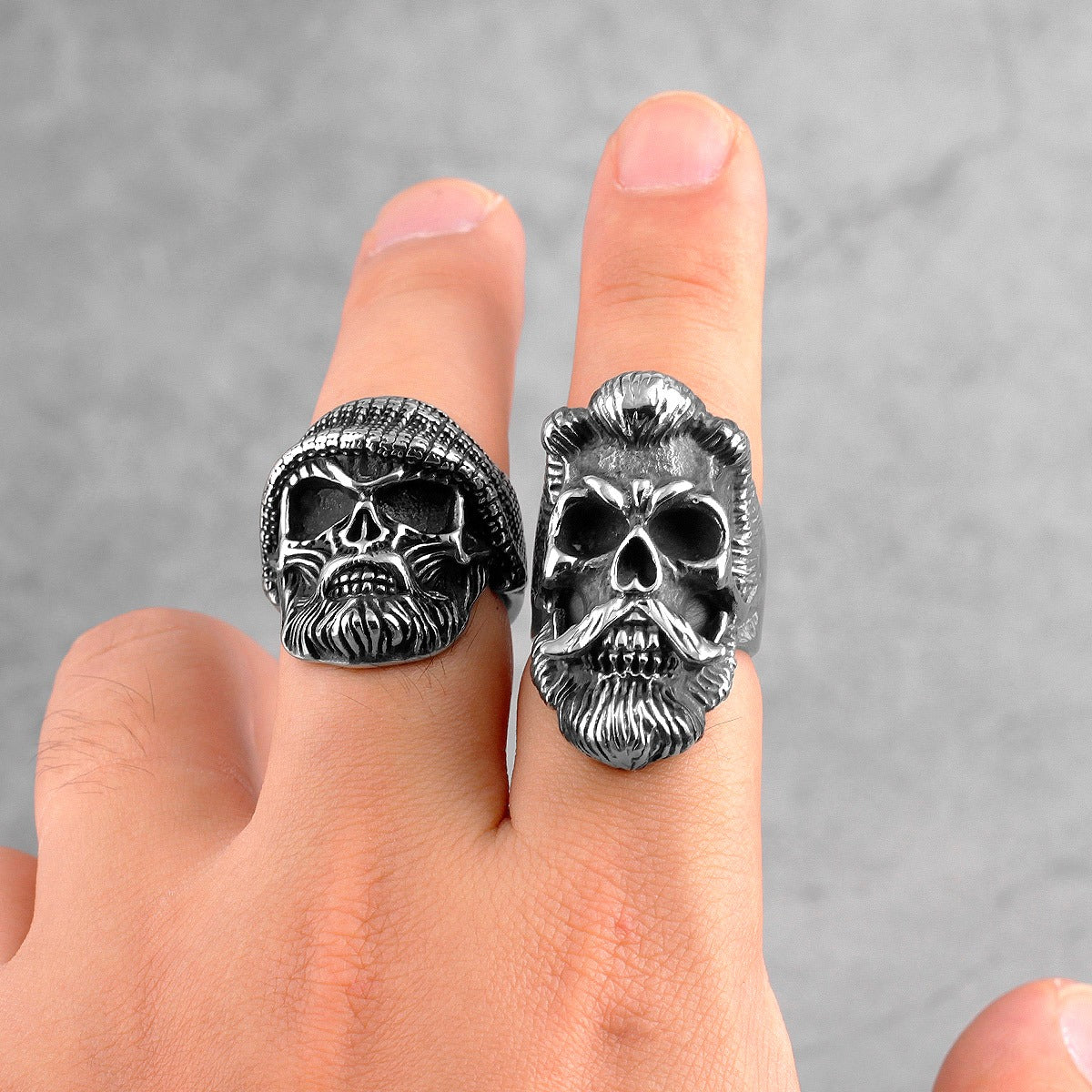 Bearded gentleman skull rings on fingers, crafted from stainless steel for a badass biker style.
