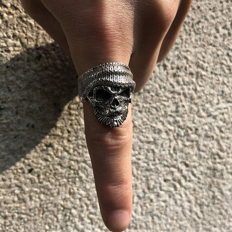 Bearded skull ring on a finger made of 925 sterling silver, perfect gothic punk rock biker jewelry.
