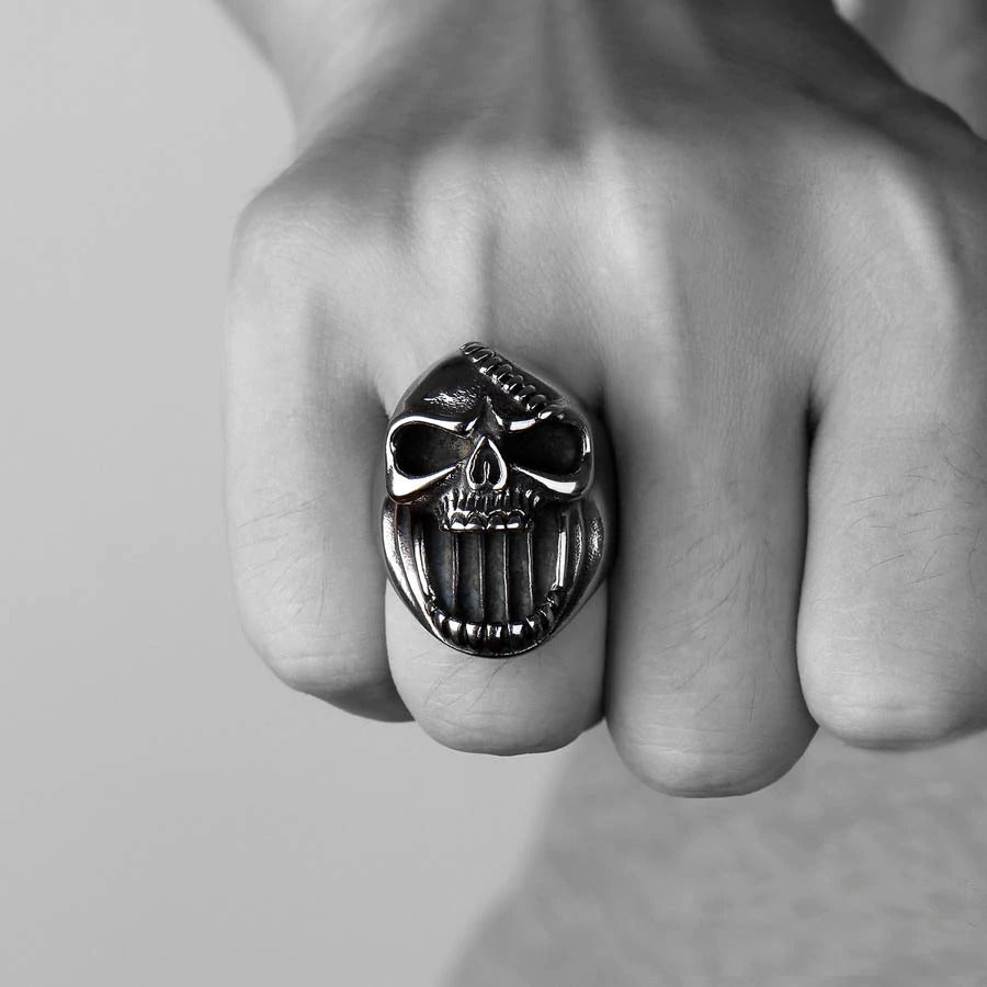 Gothic skull ring bottle opener worn on hand, perfect for punk fashion and rock outfits.