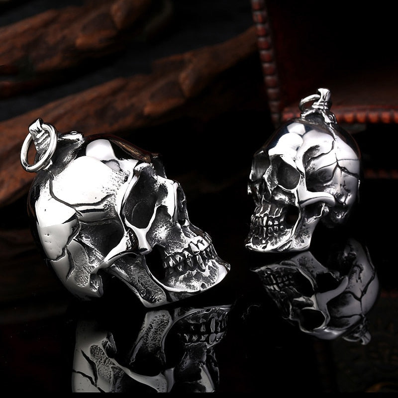 Big and small stainless steel skull pendants, perfect creepy rock accessories for men and women.