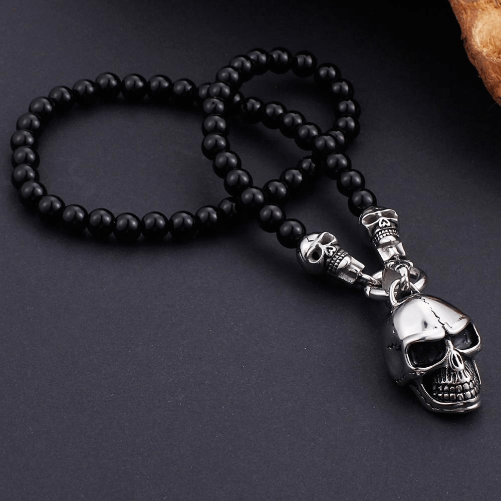 Biker chain necklace with glass beads and stainless steel skull pendant, perfect for rock style outfits.