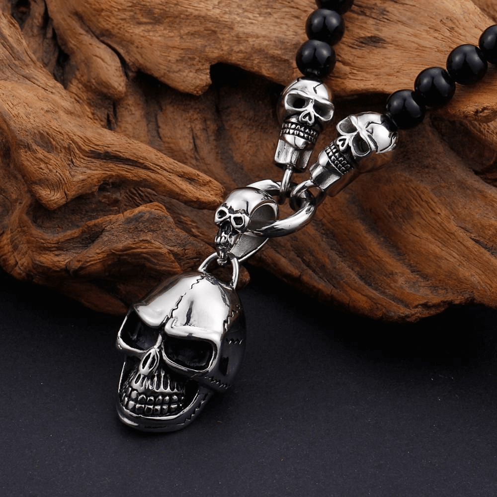 Biker chain necklace with glass beads and stainless steel skull pendant, perfect for rock style fashion.