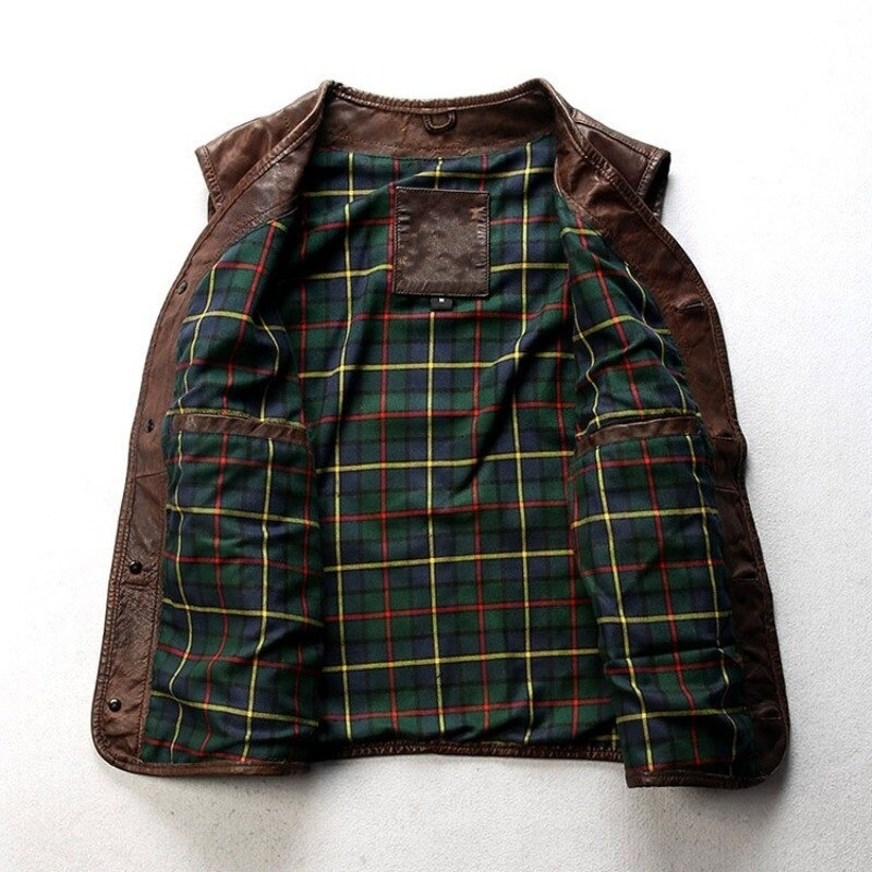 Interior view of a biker genuine leather slim fit vest featuring a plaid lining and practical pockets.