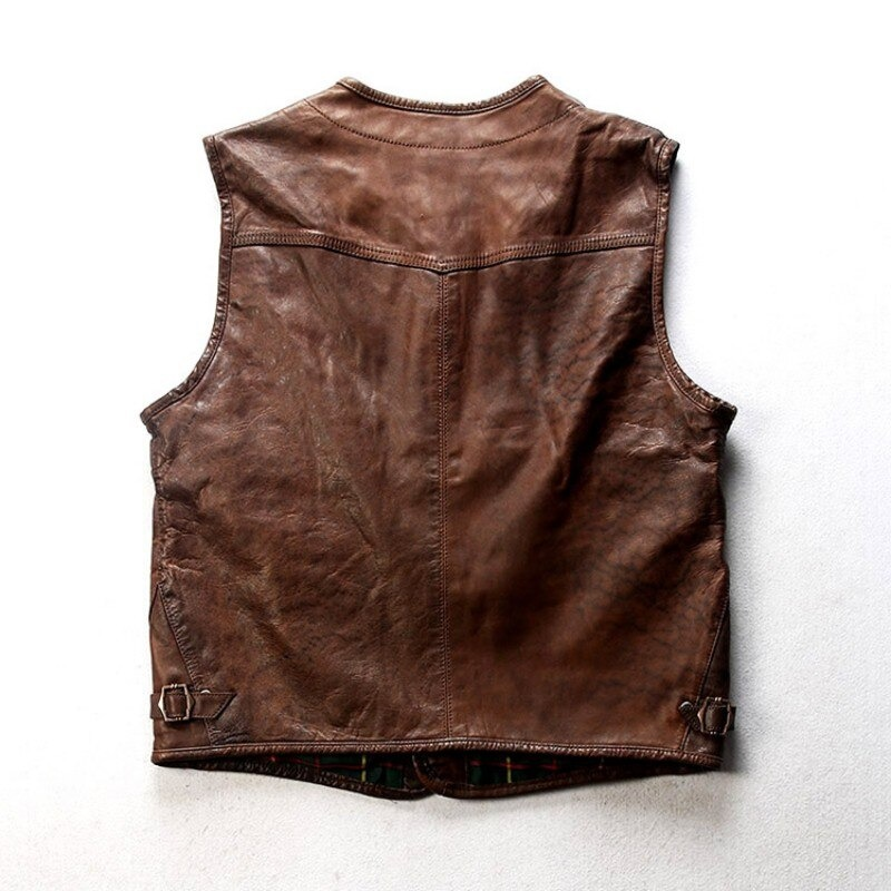 Brown genuine leather slim fit biker vest, showcasing a stylish back design and buckle details, perfect for alternative fashion.