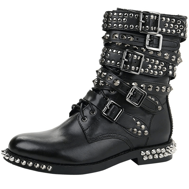 Biker women's black leather ankle boots featuring rivets, metal buckles, and studs for a stylish autumn/winter look.
