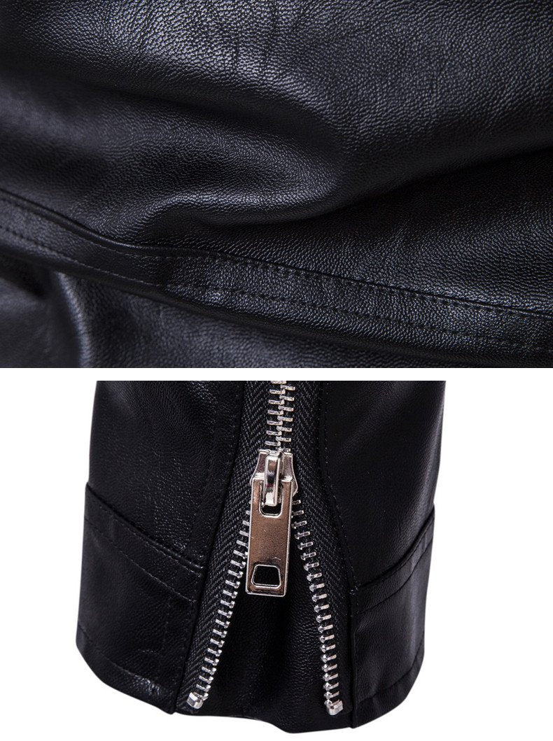 Close-up of a black faux leather biker jacket showcasing zipper detailing and textured fabric.