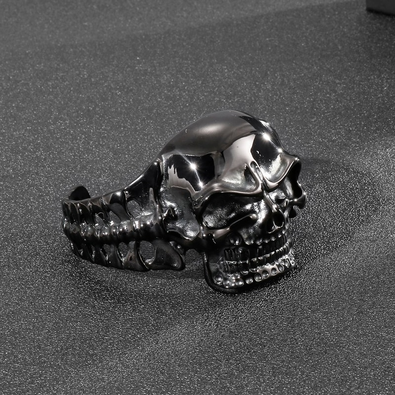 Gothic men's black stainless steel bracelet with detailed skull design, perfect for edgy fashion styles.