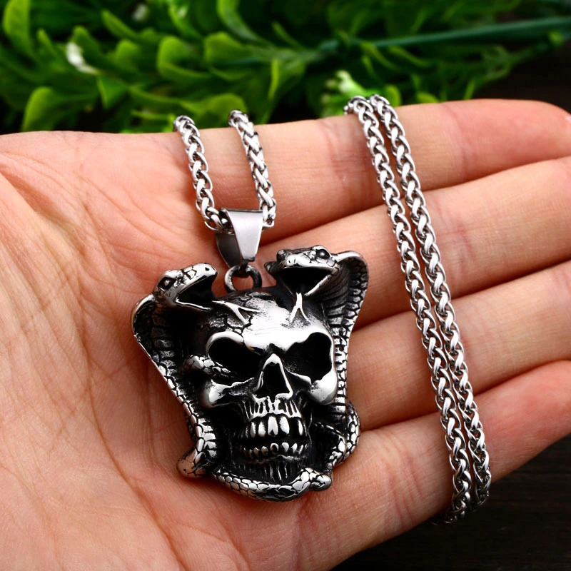 Biker pendant necklace featuring a devil skull skeleton with snakes, perfect punk accessory for bikers.