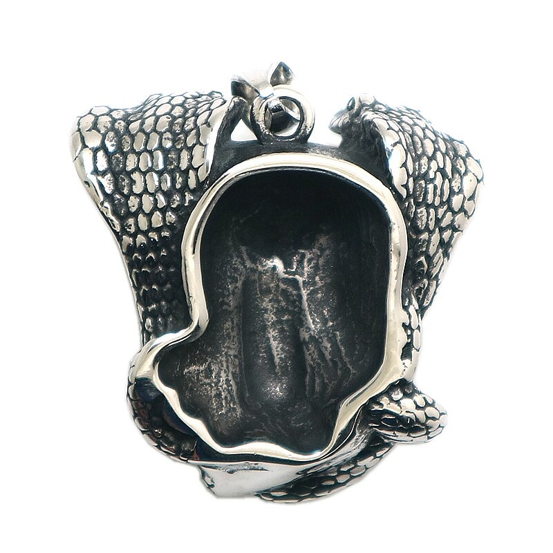 Intricate silver snake pendant with a hollowed-out center, ideal for a punk jewelry collection.