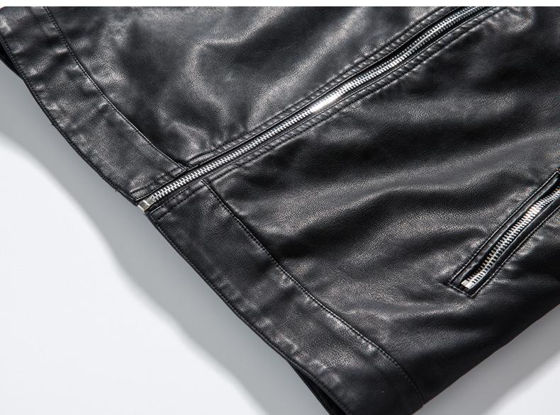 Close-up of black biker leather jacket showcasing zippers and smooth texture, ideal for rock and goth styles.
