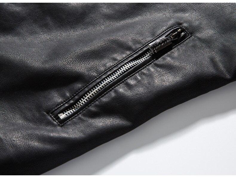 Close-up of a black leather jacket sleeve showcasing a stylish zipper detail for a rugged biker look.