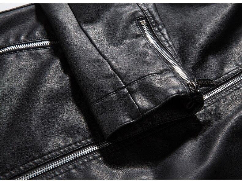 Close-up of black PU leather biker jacket with zippers, showcasing stylish and durable design for rock and goth fashion.