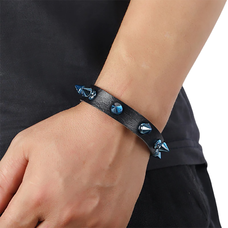 Unisex PU leather bracelet with blue spikes, perfect for punk style and trendy looks.