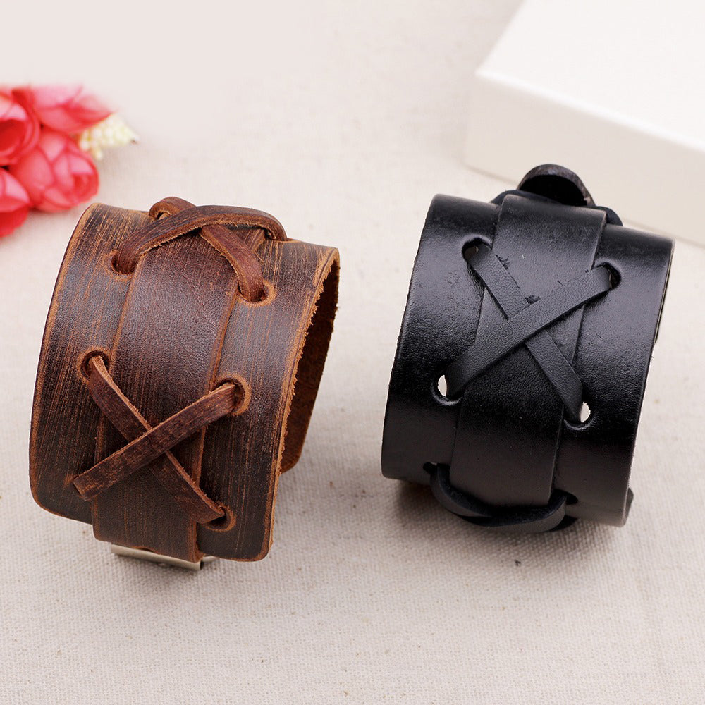 Stylish black and brown genuine leather wide bracelets for men and women, featuring x-type leather decoration.