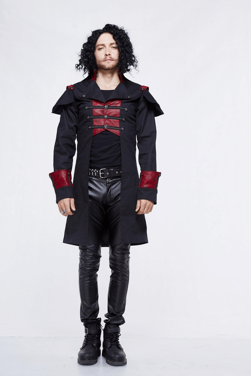 Gothic male model in black and red slim fit coat with stylish design, showcasing a unique cape look.