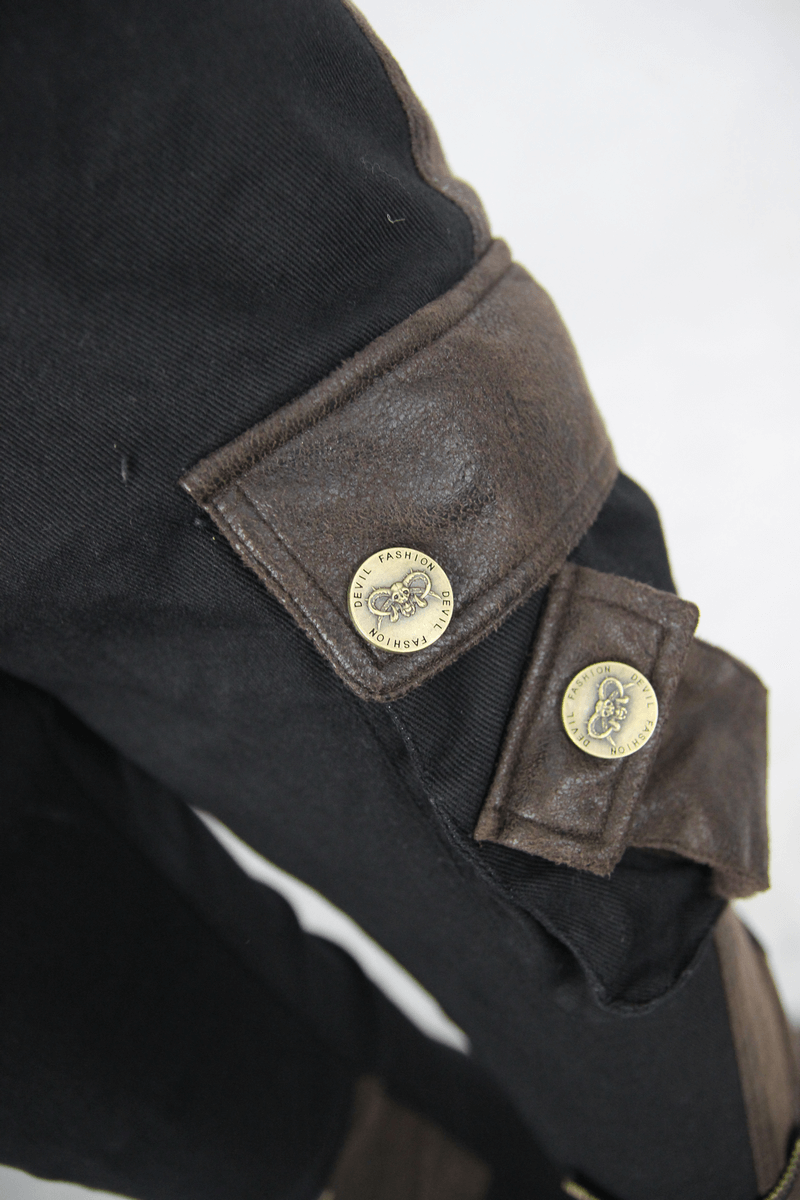 Close-up of multi-pocket detail on black and coffee steampunk biker trousers for men.