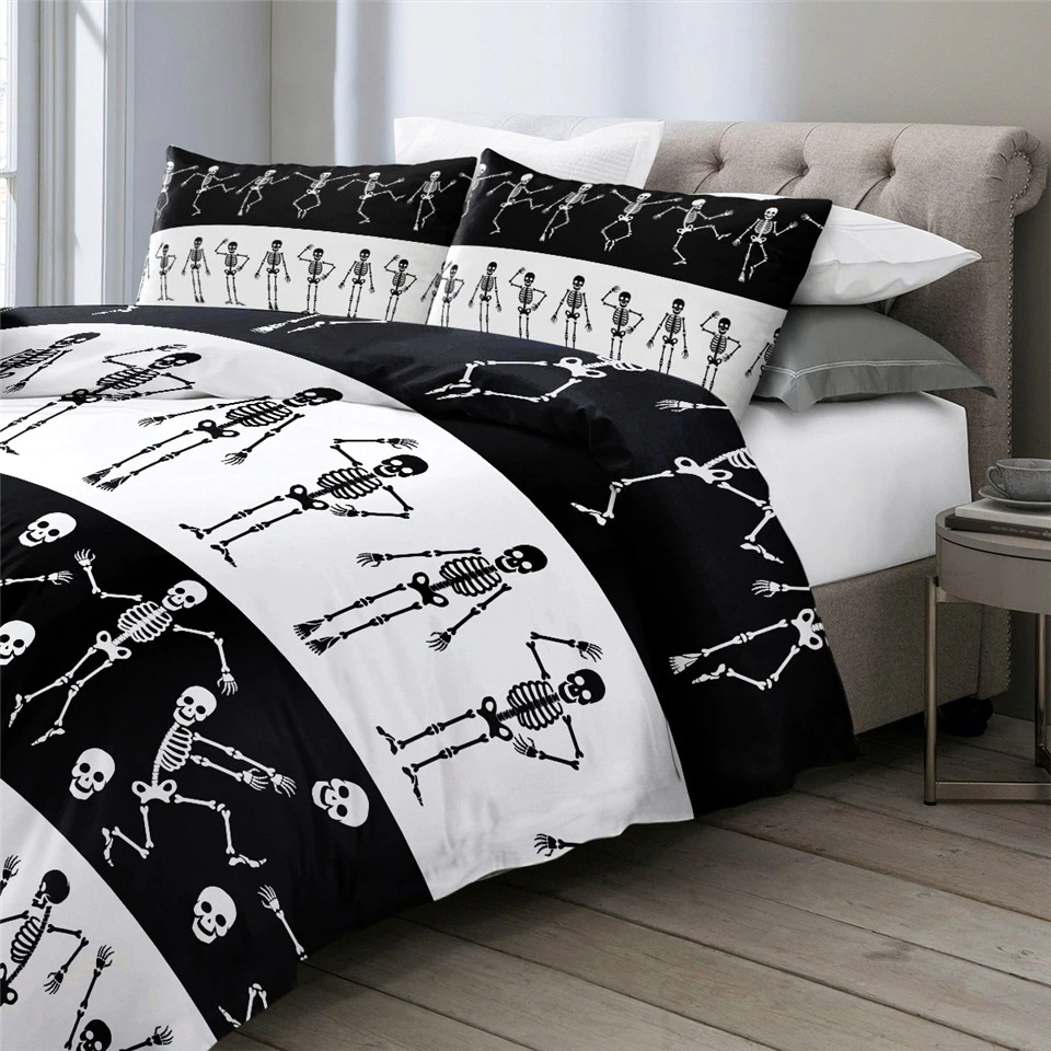 Black and white bedding set featuring small skeleton prints, perfect for a gothic style bedroom.