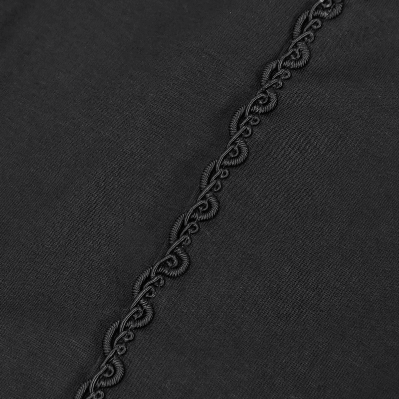 Close-up of stylish black fabric featuring elegant lacing detail, perfect for gothic leggings.