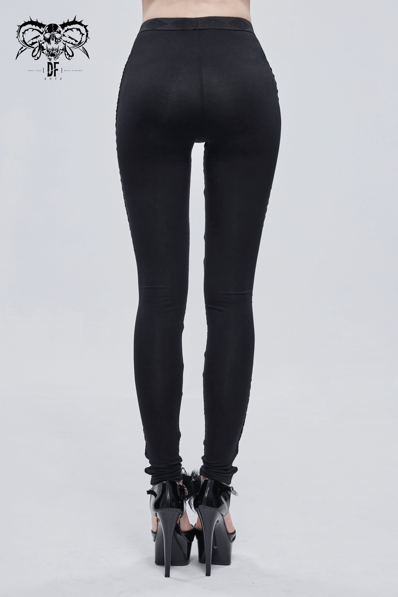 Back view of women's black gothic leggings, showcasing form-fitting design and stylish finish.