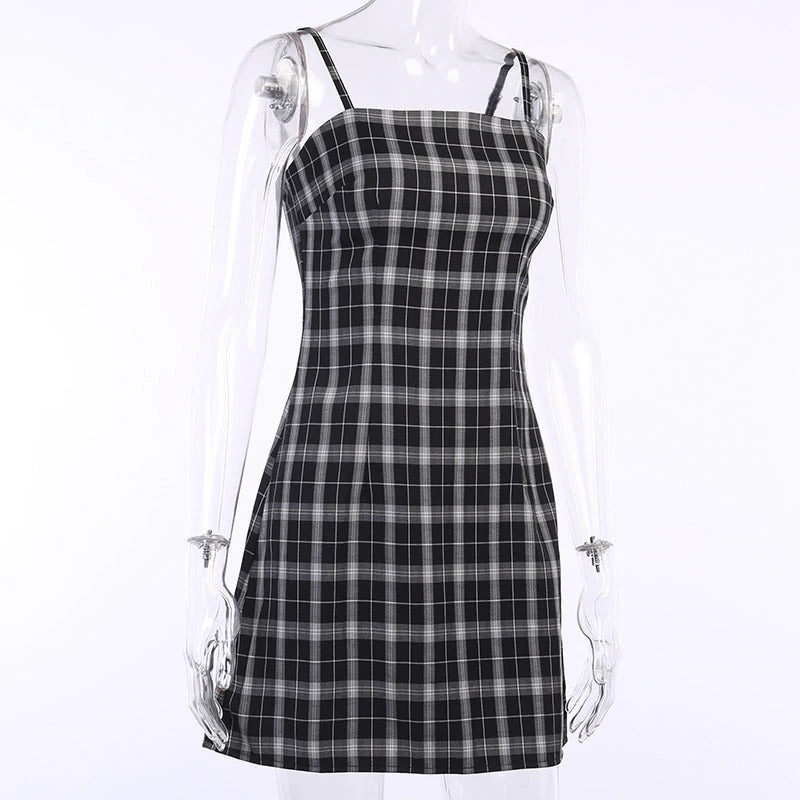 Black and white plaid sleeveless mini dress with empire waistline, perfect for grunge outfits this summer.
