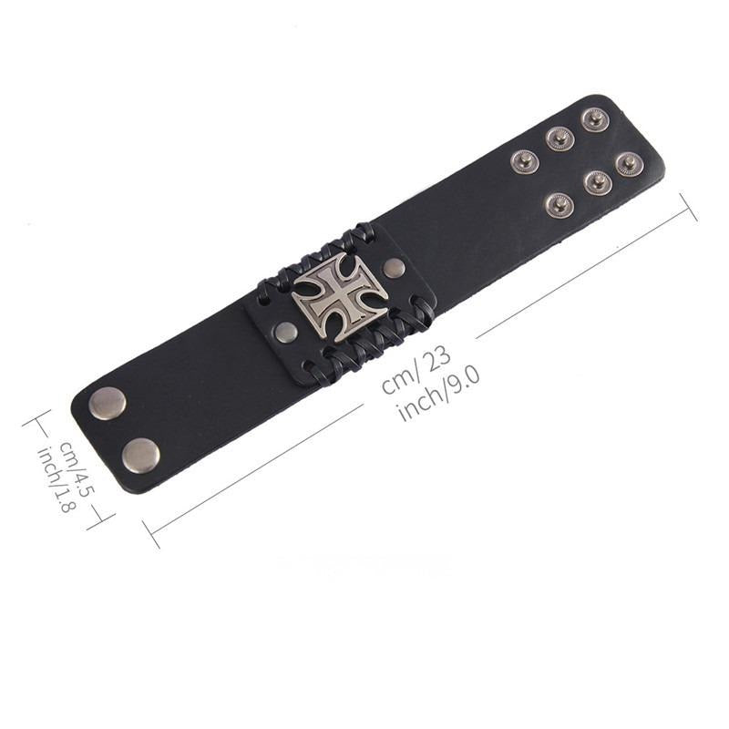 Wide black leather bracelet with Celtic cross design, featuring adjustable clasp and stylish metal studs.