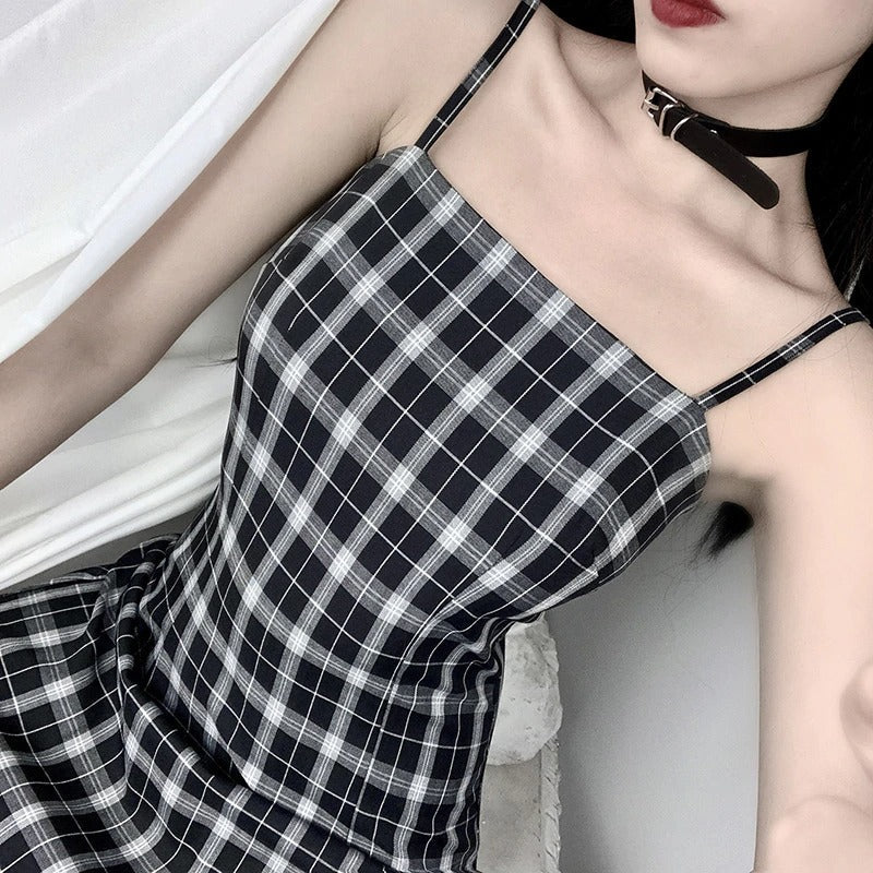 Gothic black and white plaid sleeveless mini dress with empire waistline, perfect for summer evenings.