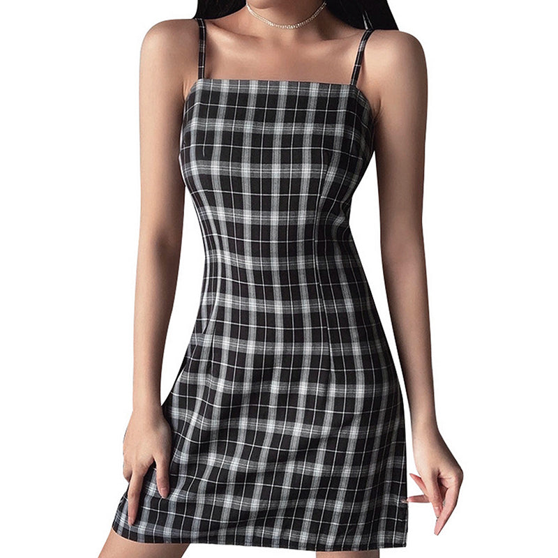 Black and white plaid mini dress with sleeveless design, perfect for summer evenings and stylish grunge outfits.