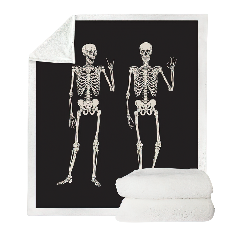 Black and white plush blanket featuring funny skeletons in a gothic style, perfect for cozying up.