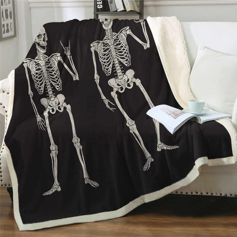 Black and white plush blanket featuring funny skeletons, perfect for a gothic touch in any home.