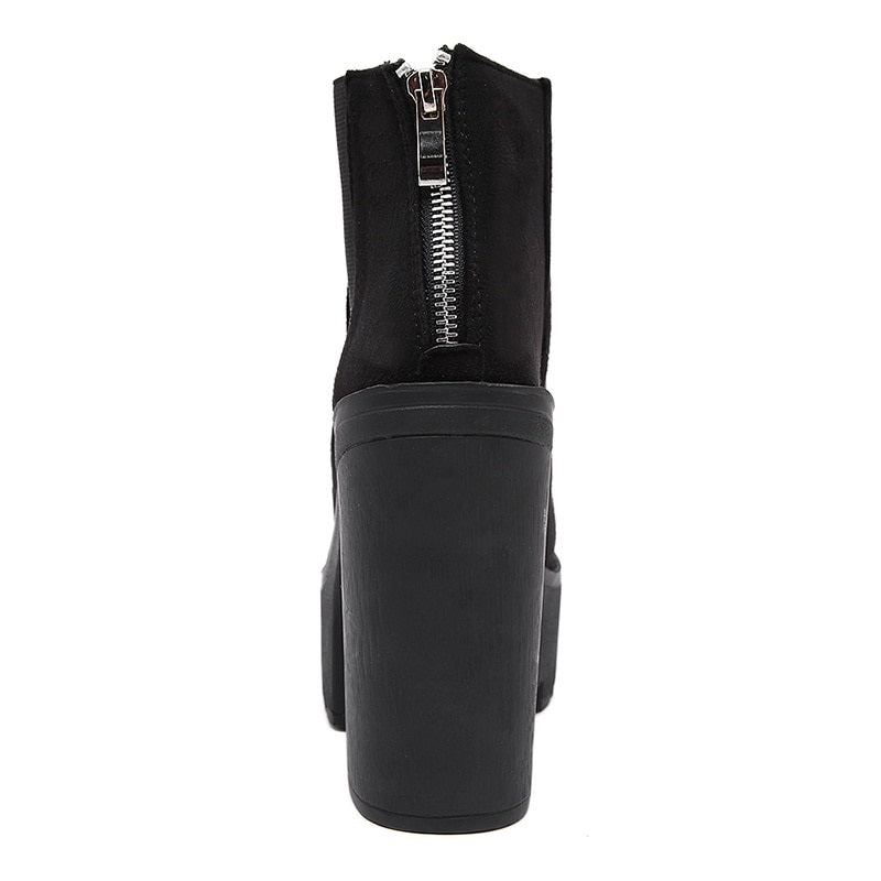 Stylish black ankle boots with thick heel and zipper, perfect for rocker outfits and all seasons.