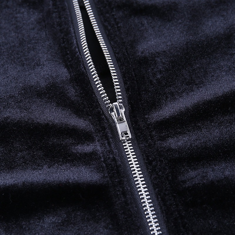 Close-up of a black velvet zipper detail on a gothic women's top, showcasing premium material and design.