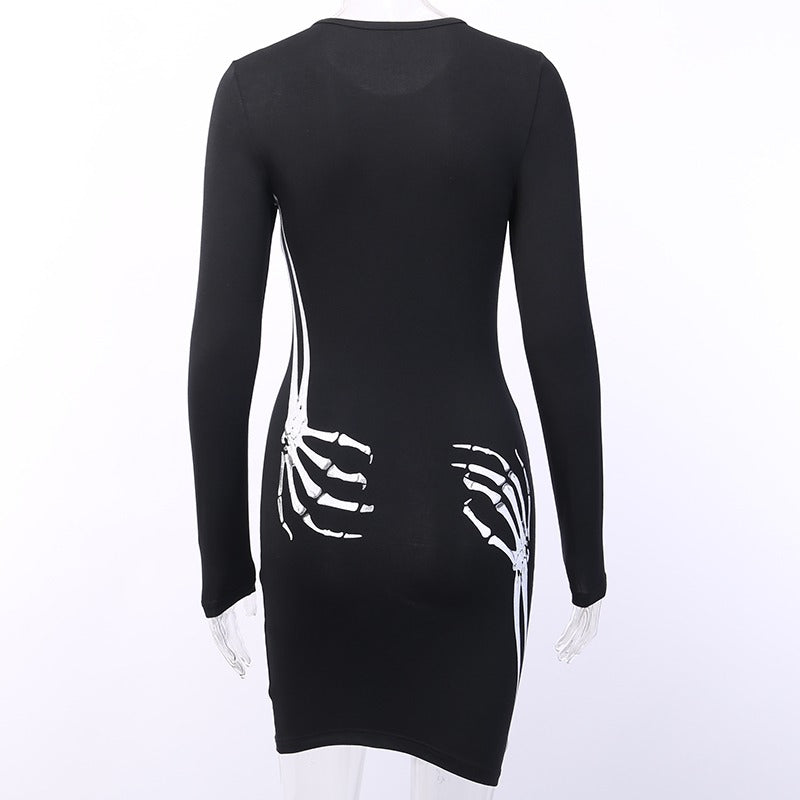 Back view of black bodycon mini dress with white skull print, perfect for Gothic streetwear and Halloween.