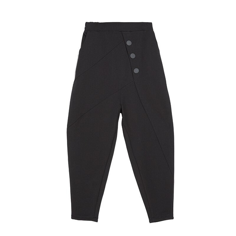 Black high waist women's pants with buttons and pockets, perfect for trendy alternative style in spring and fall.
