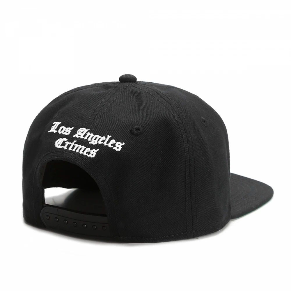Black adjustable cap featuring 'Los Angeles Crimes' text on the back, stylish for casual wear.