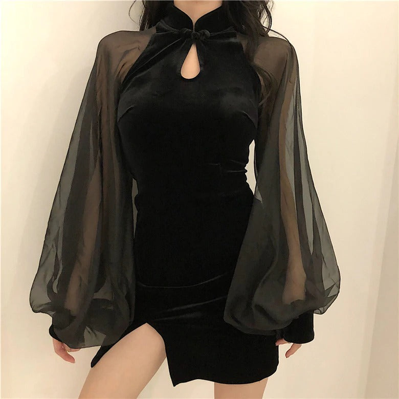 Black gothic velvet dress with mesh lantern sleeves and keyhole detail, perfect for elegant evening wear.