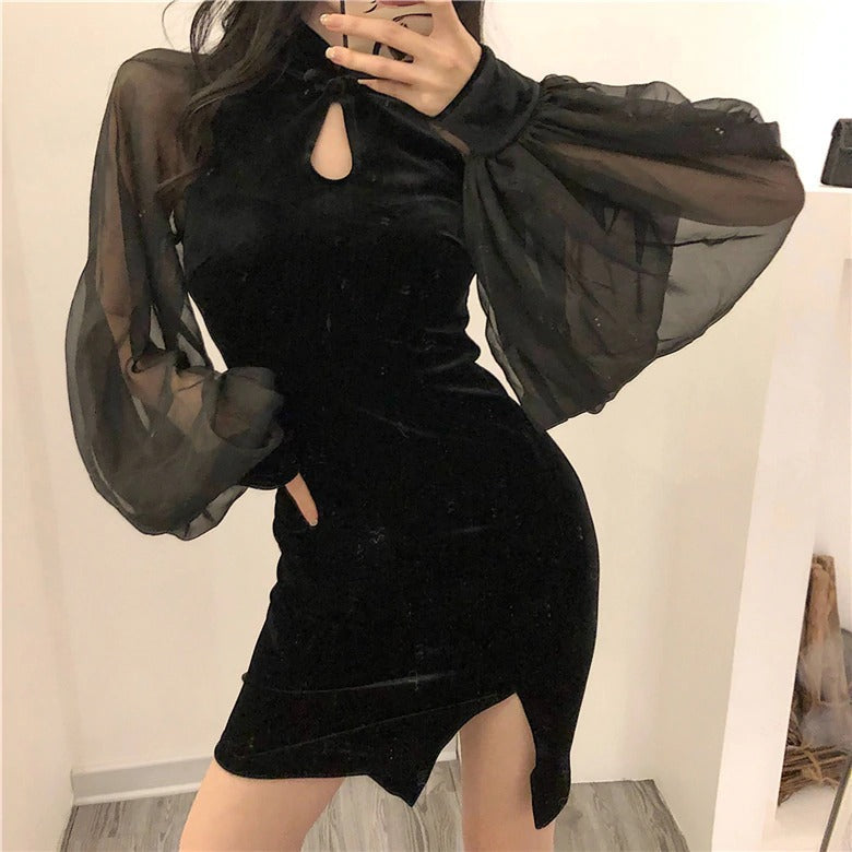 Black velvet goth dress with mesh lantern sleeves, featuring a chic keyhole design, perfect for edgy elegance.