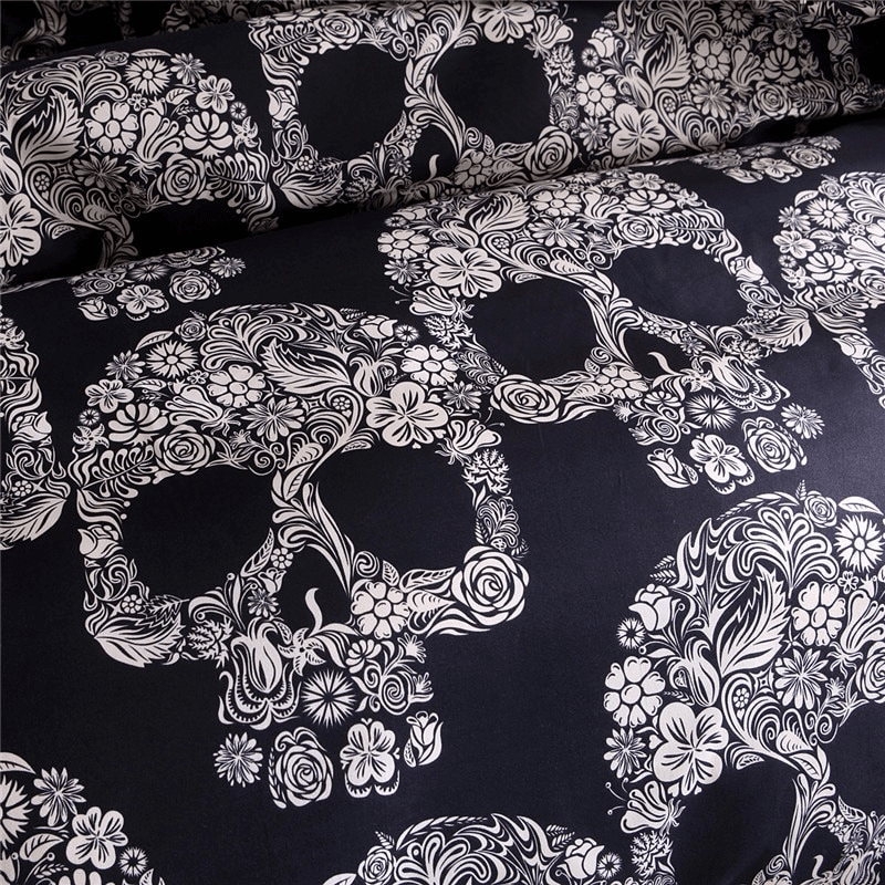 Gothic black duvet cover featuring intricate white floral sugar skull design, perfect for stylish bed decor.