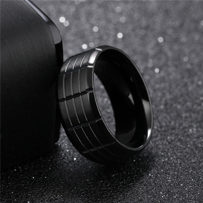 Black stainless steel ring with a striking pattern, perfect for alternative fashion and rockers, sizes 7-11.