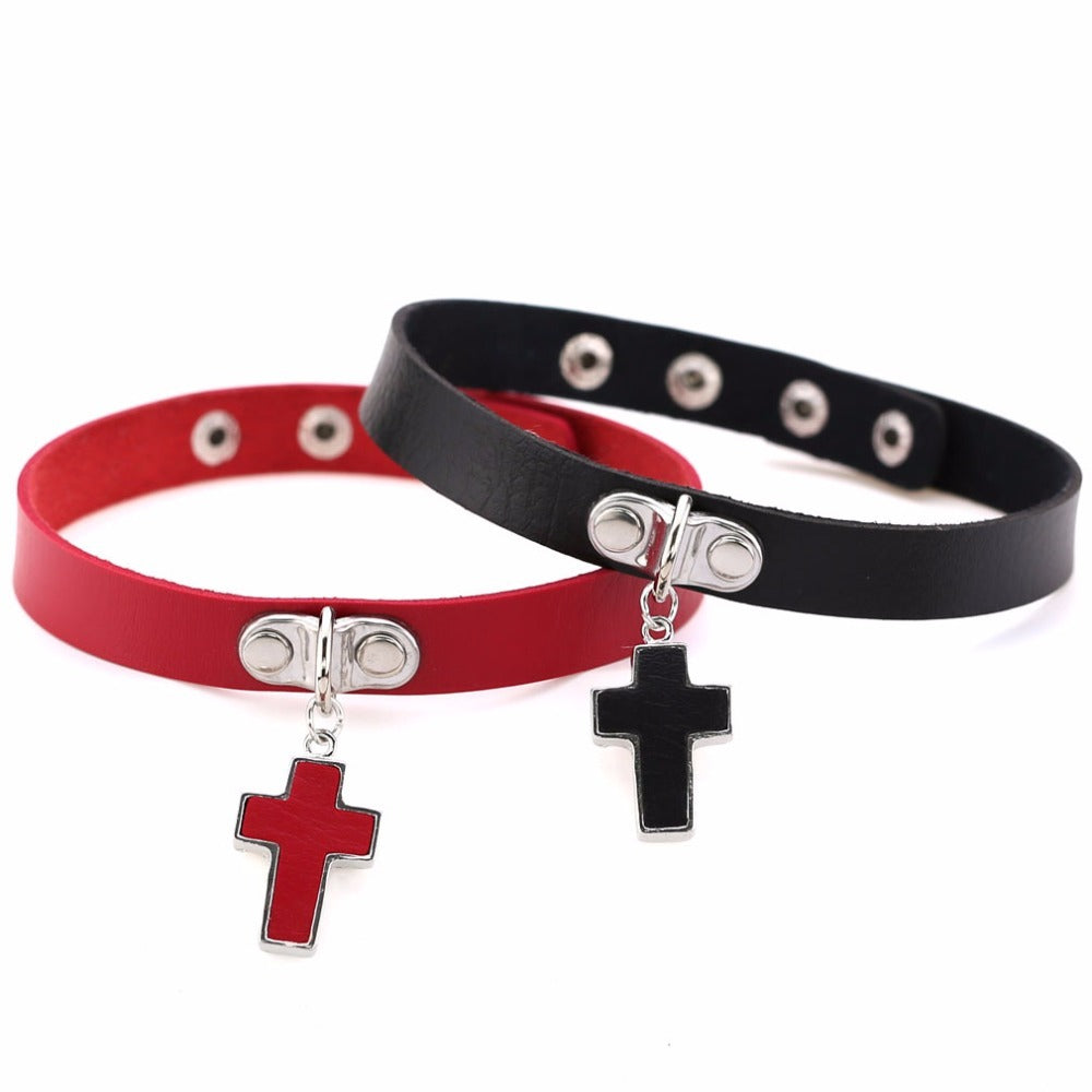 Black and red Gothic leather chokers with cross charms, perfect for adding a bold touch to any outfit.