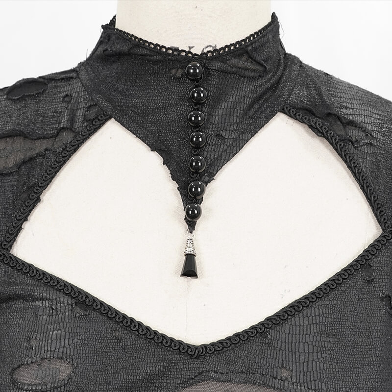 Close-up of the neckline detail on the Black 'Dragon Spine' Gothic Dress featuring lace and decorative beads.