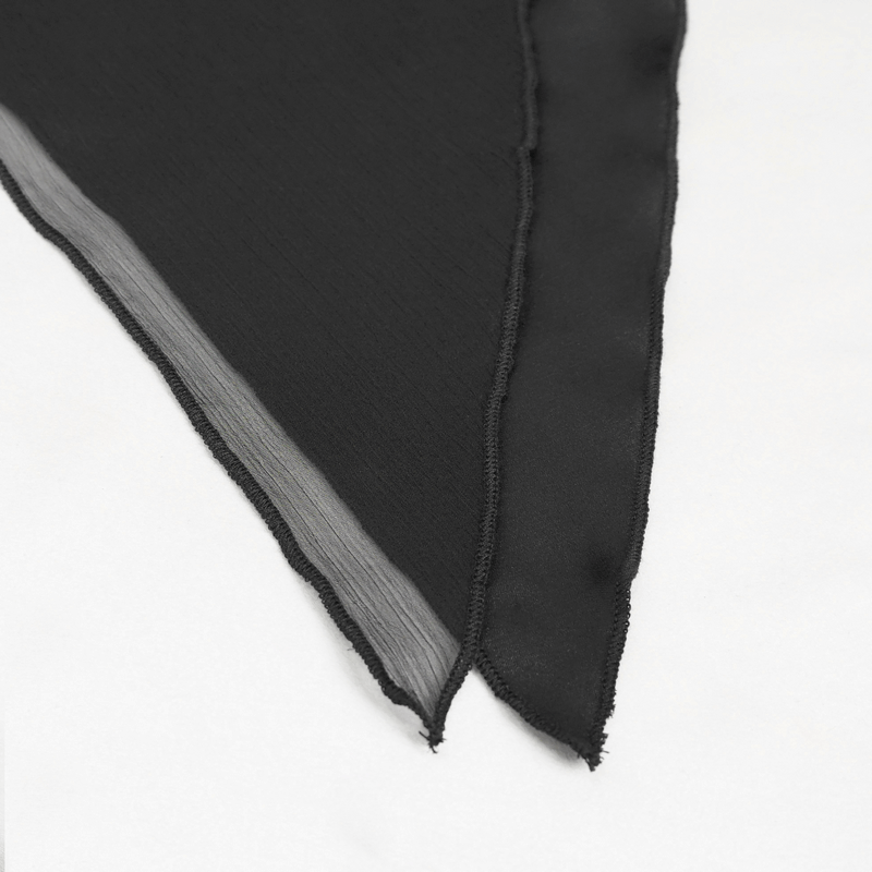 Close-up of black fabric with a smooth finish, showcasing the elegant texture and delicate edges for fashion design.