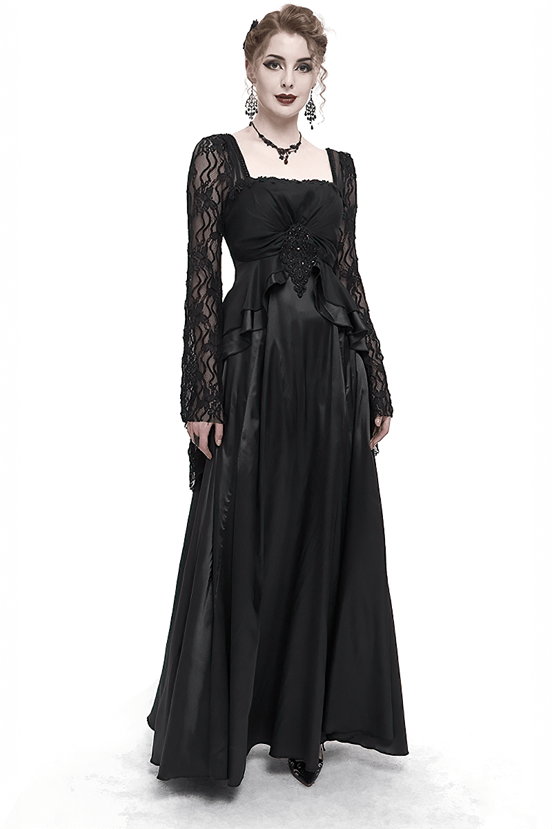 Elegant black long dress with square neck and appliqued design, featuring long lace sleeves and flattering silhouette.