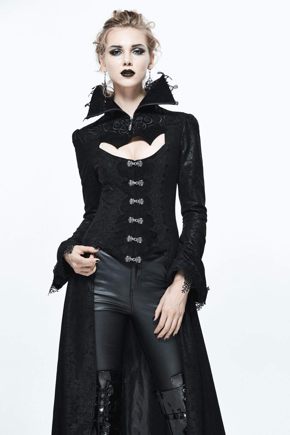 Gothic embossed black long coat with high collar and lace accents, embodying Victorian elegance and bold fashion.