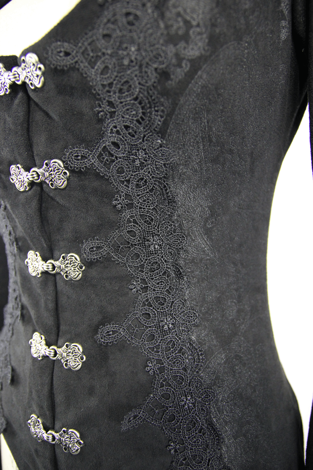 Close-up of black embossed Gothic long coat with intricate lace detailing and elegant silver buttons.
