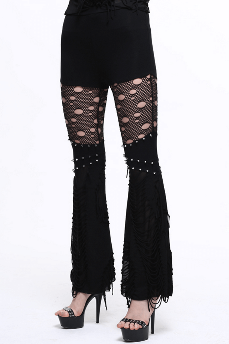 Women’s black flared pants with lace mesh inserts and shreds for a gothic fashion statement.