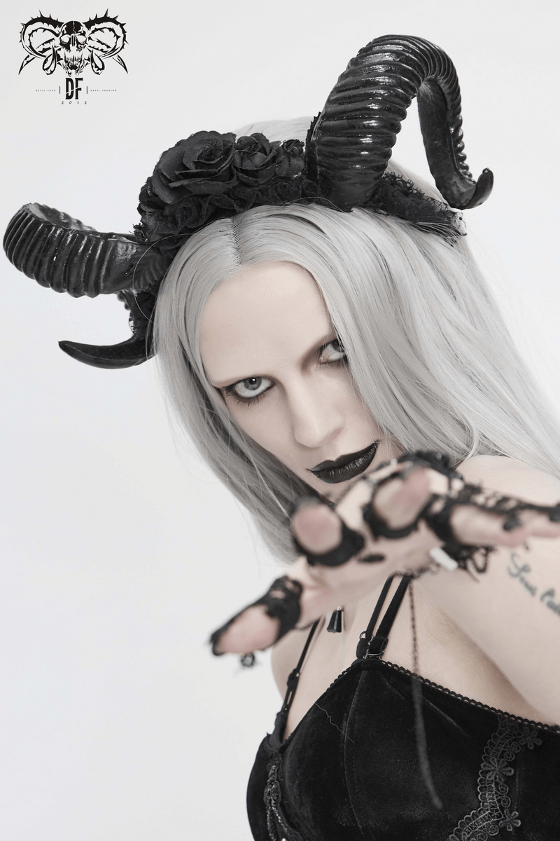 Gothic black devil horn headdress with roses worn by model, perfect for women's fashion accessories.