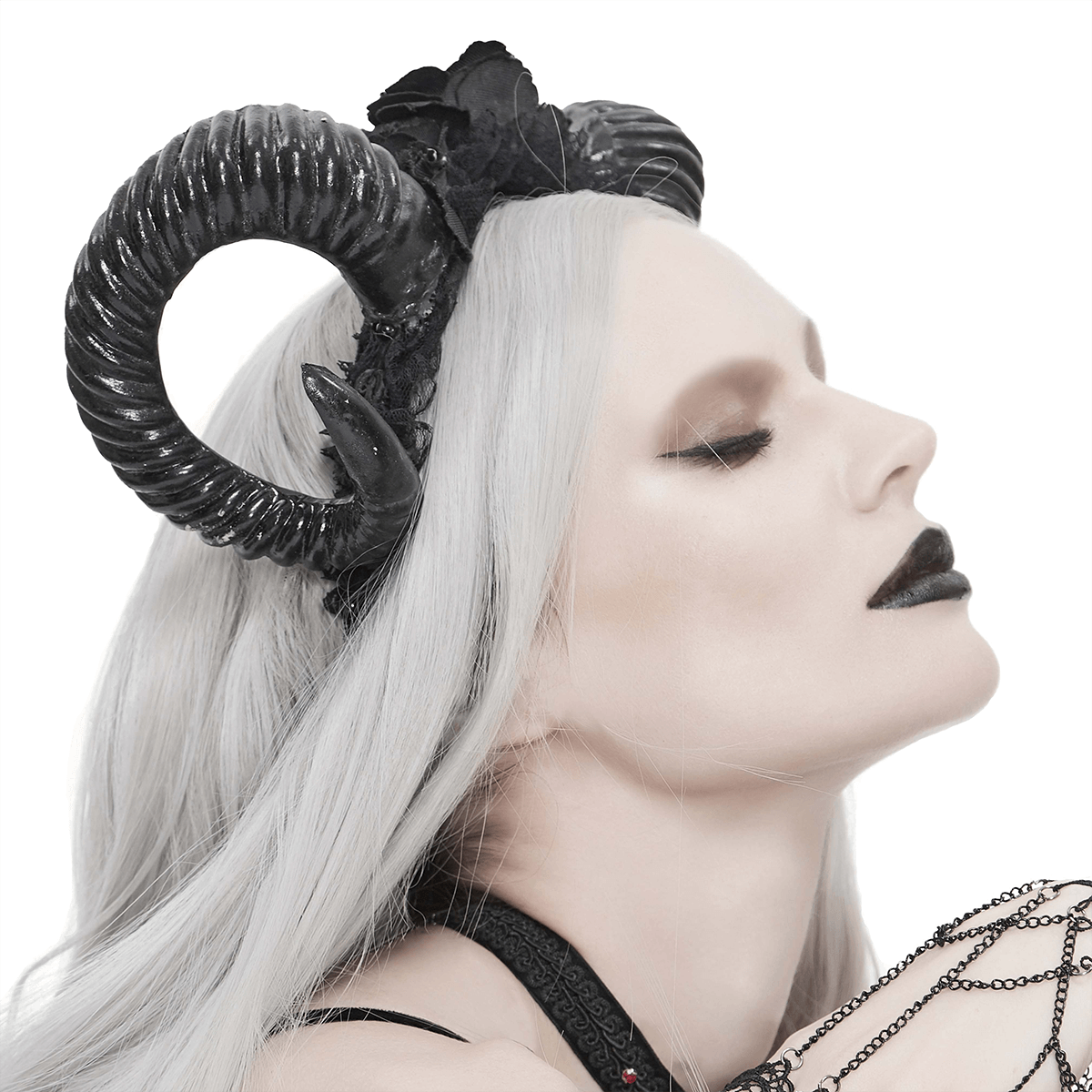 Black Gothic devil horn headdress worn by a model, featuring roses, perfect for gothic fashion enthusiasts.